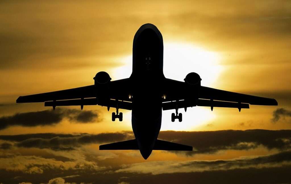 aircraft, sunset, silhouette, clouds, sky, dusk, twilight, airplane, flight, flying, flying plane, transportation, nature, passenger plane, backlighting, plane silhouette